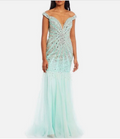 dazzling entrance in this stunning mint green formal gown!